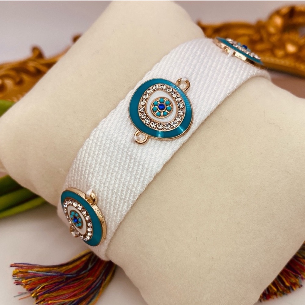 Urban Outfitters White and Blue Evil Eye Charm Bracelet
